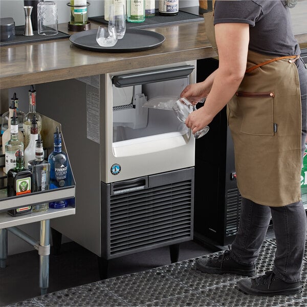 Hoshizaki KM-81BAJ 17 3/4" Air-Cooled Undercounter Crescent Cube Ice Machine with 38 lb. Storage - 86 lb., 115V